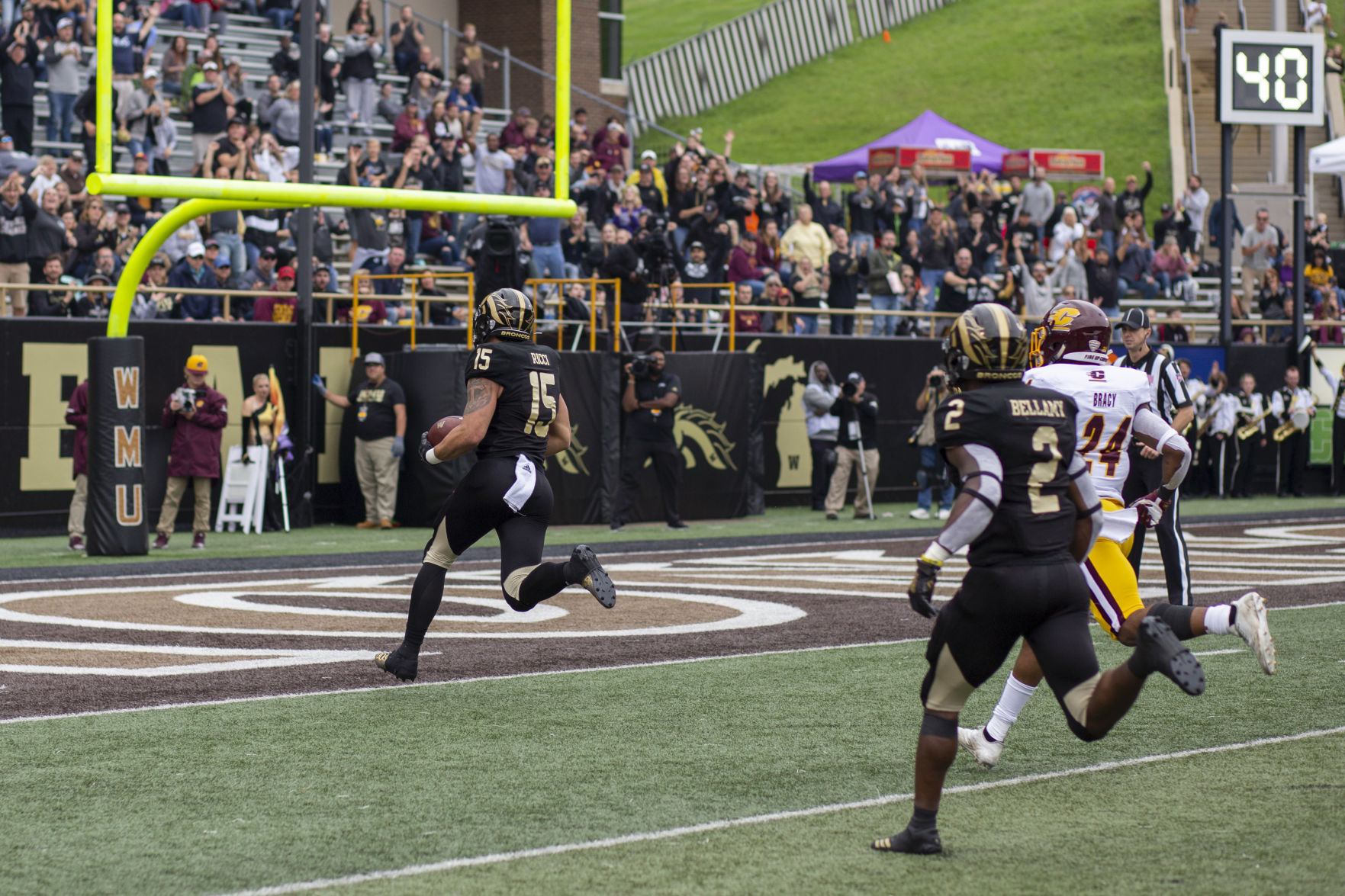 Tight end Giovanni Ricci (15) runs over the goal line adding to the lead. The Broncos would later win the game 31-15 against Central Michigan.